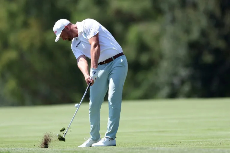 ‘Solid’ Clark takes solo lead at BMW Championship