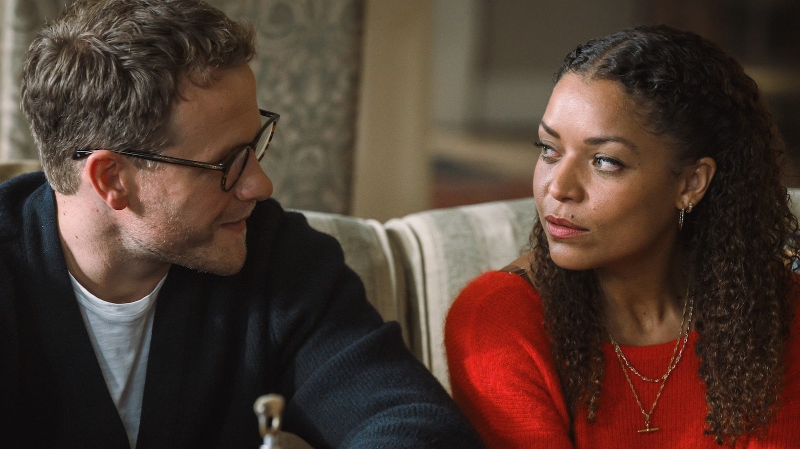Tommy & Tuppence’s Antonia Thomas And Josh Dylan Take Us Inside BritBox’s Flirty, Fun Agatha Christie Adaptation
