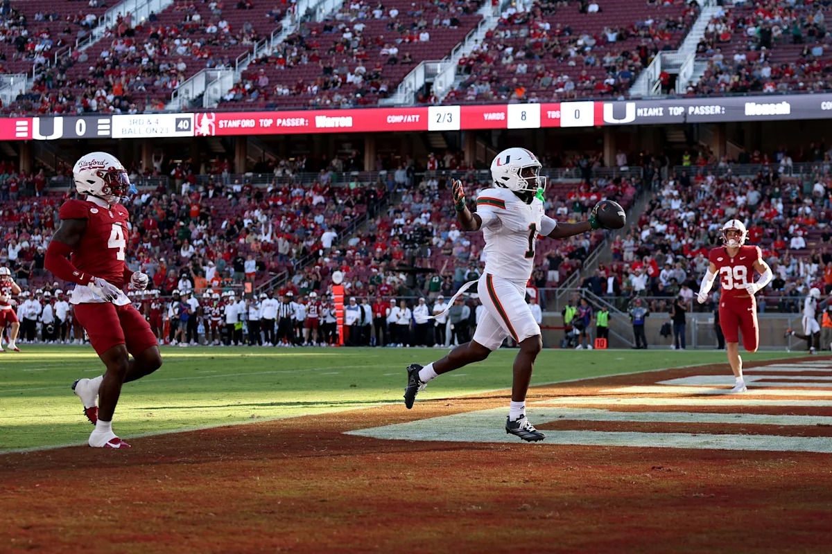 Malachi Toney catches 3 of Darian Mensah’s 5 TD passes in No. 7 Miami’s Week 1 rout of Stanford