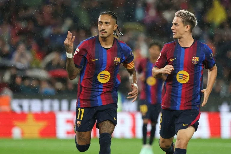 Barcelona hit seven in Racing Santander rout